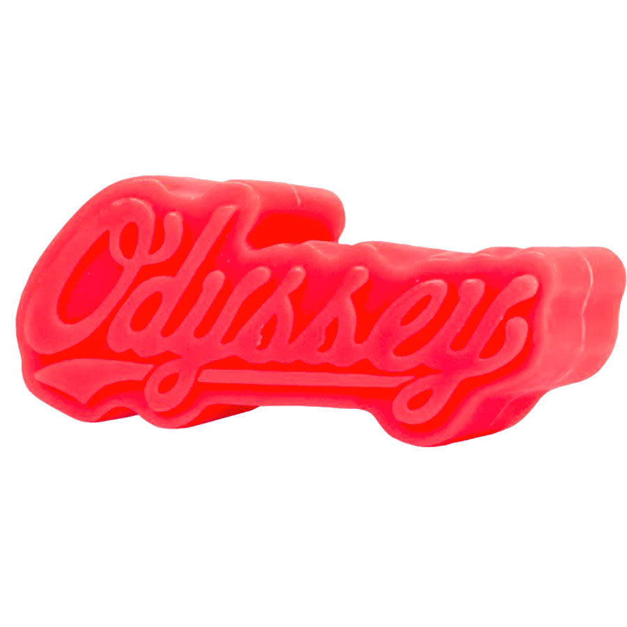 The Odyssey Slugger Wax in red, placed on a white background, creates an eye-catching design.