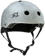 The S-One Lifer Helmet in White Glitter features black padding, ventilation holes, an adjustable chin strap, and a side "S1" logo. Designed for action sports, it offers multi-impact protection for superior safety.