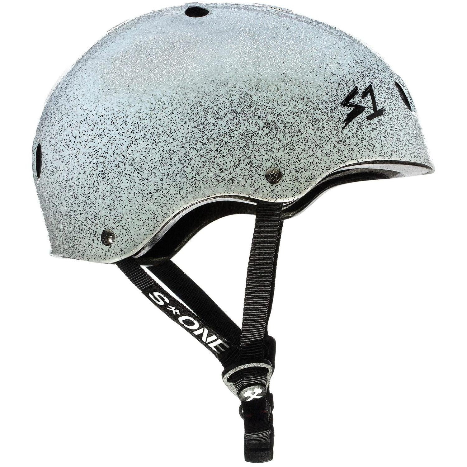 A S-One Lifer Helmet in White Glitter, shown from the side against a white background, features black straps and buckle and offers multiple impact protection.