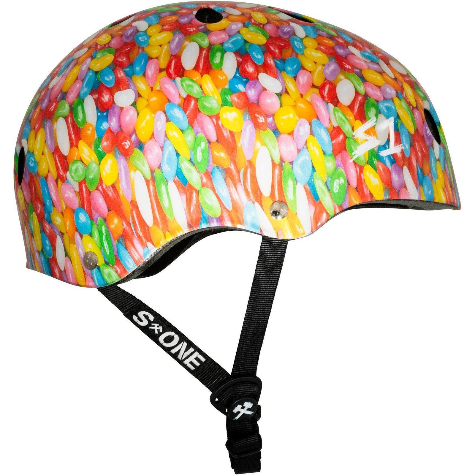 The S-One Lifer Helmet / Jelly Beans is a certified skateboard helmet with a vibrant jelly bean pattern, black adjustable straps, multi-impact protection, and the S1 logo on the side and strap.