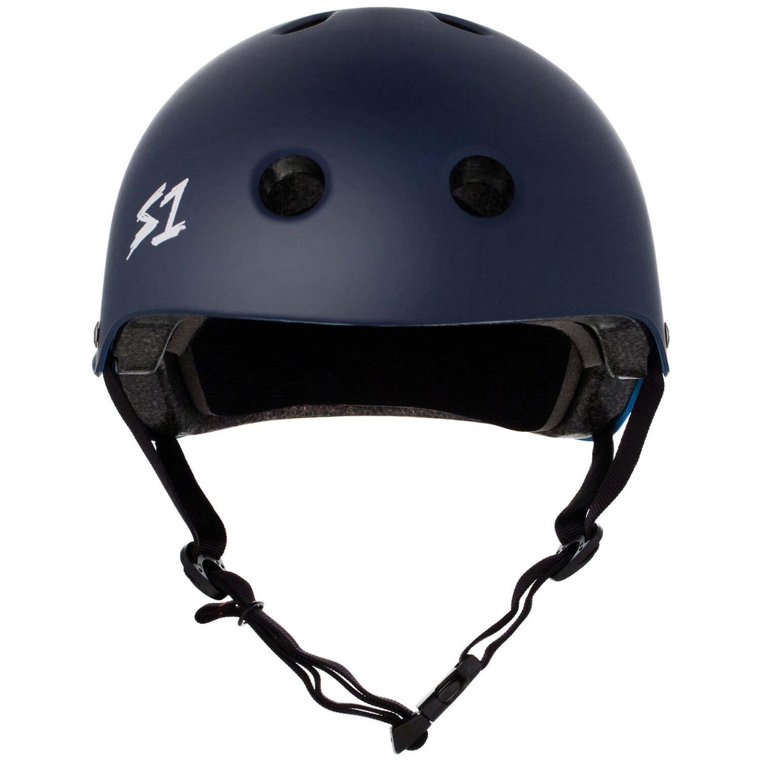 The S-One Lifer Helmet / Navy Matte is a dark blue skate helmet with ventilation holes, an adjustable chin strap, certified multi-impact protection, and a white "S1" logo on the left side.