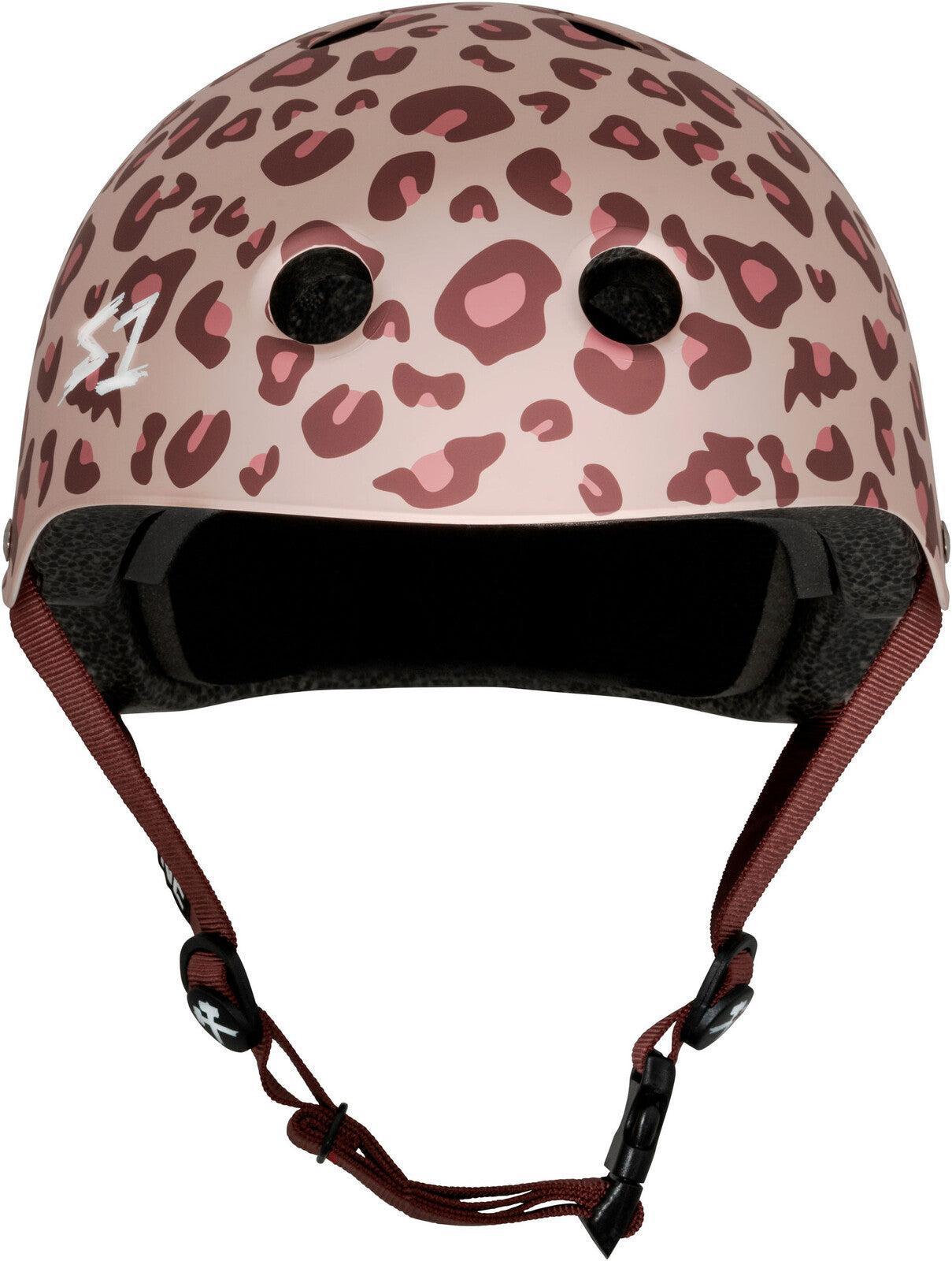 The S-One Lifer Helmet in Light Pink Cheetah from the Pink Helmet Posse Collab features a pink shell with cheetah print, multiple impact protection, ventilation holes, and an adjustable chin strap—ideal for skating.