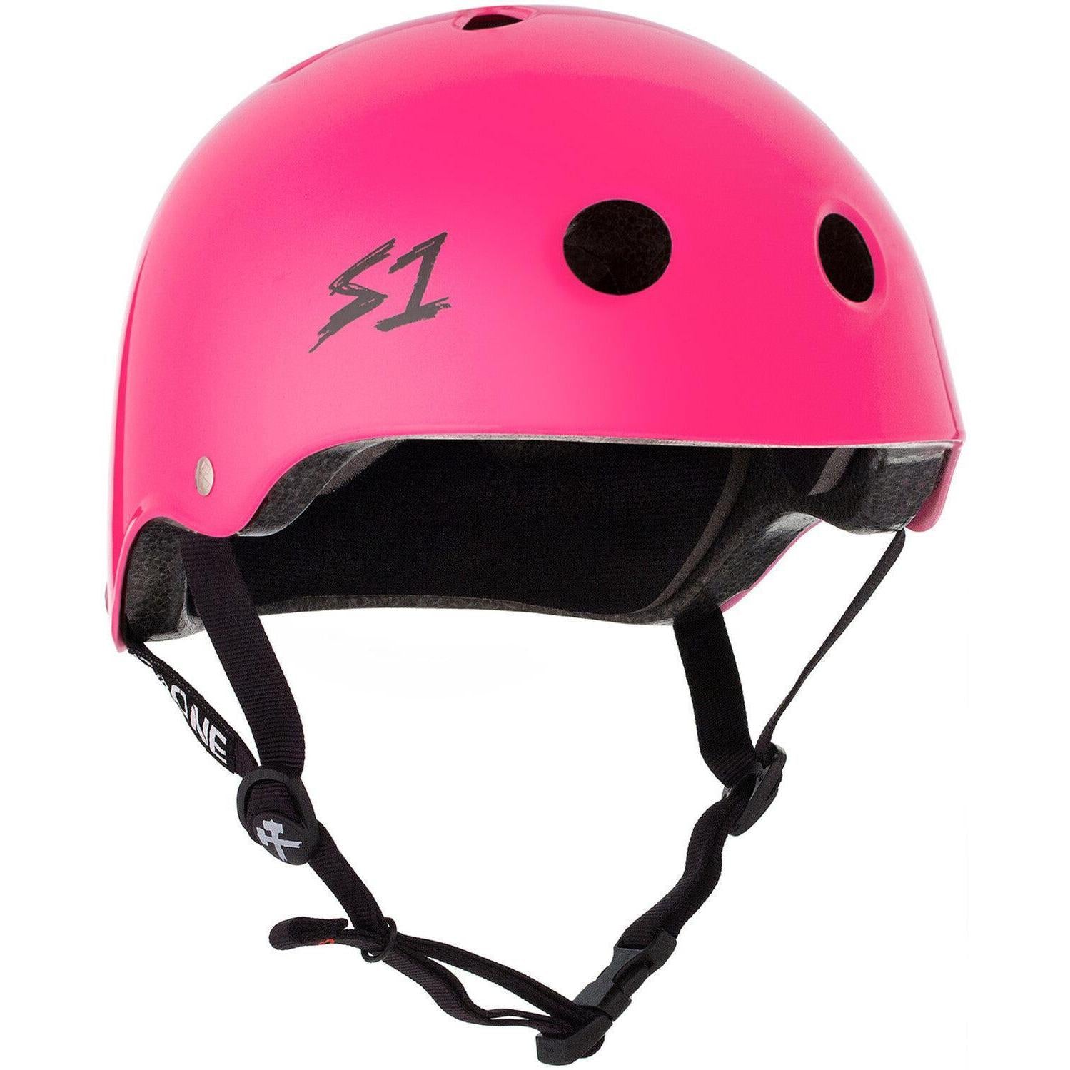 The S-One Lifer Helmet in Hot Pink Gloss features black ventilation holes, multiple impact protection, an adjustable chin strap, and an "S1" logo on the side.