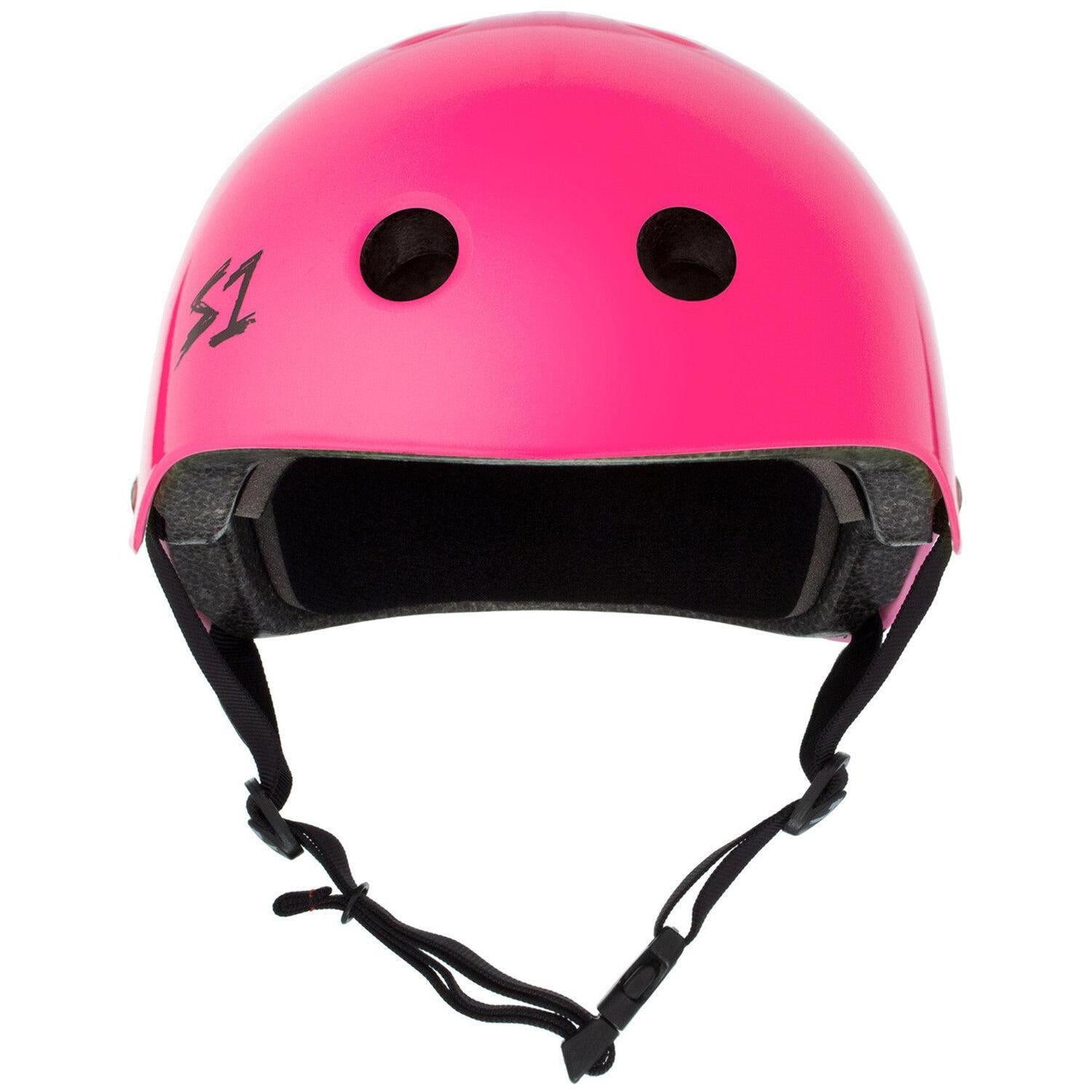 The S-One Lifer Helmet in Hot Pink Gloss features black vents, a front "S1" logo, multi-impact protection, and an adjustable chin strap—your certified skate helmet for style and safety.