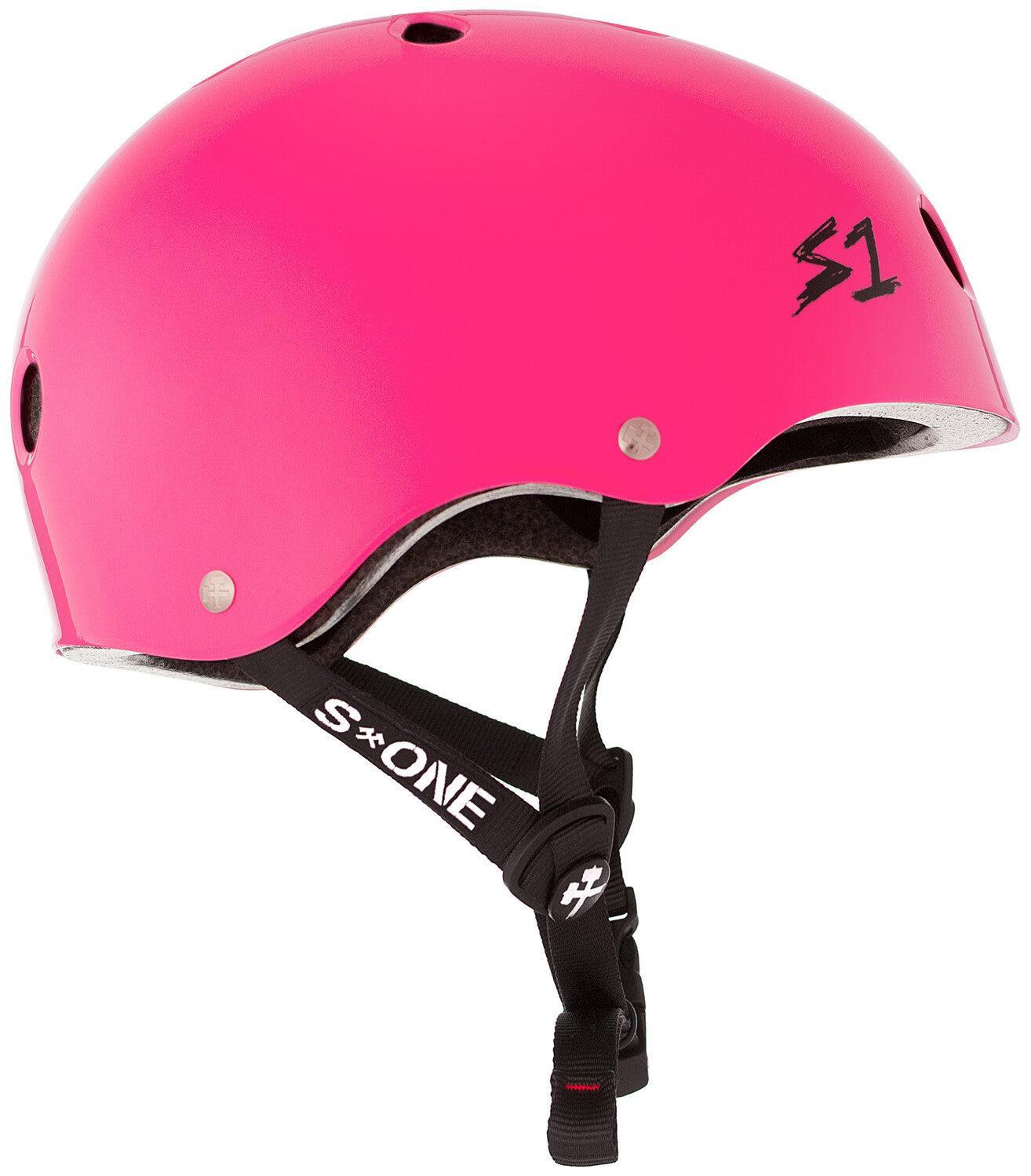 The S-One Lifer Helmet in Hot Pink Gloss features ventilation holes, multiple impact protection, and a black adjustable chin strap.