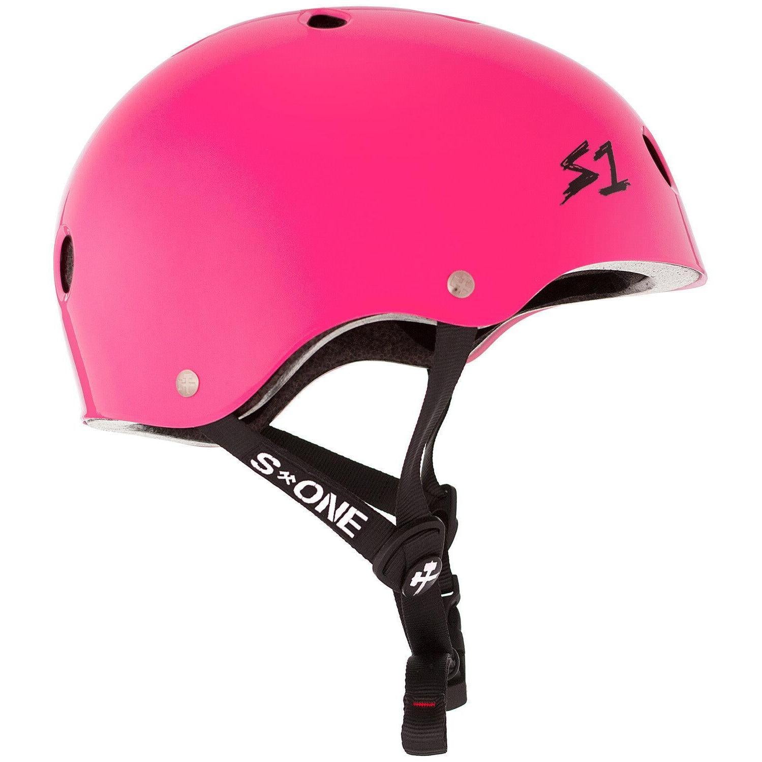 The S-One Lifer Helmet in Hot Pink Gloss features ventilation holes, multiple impact protection, and a black adjustable chin strap.