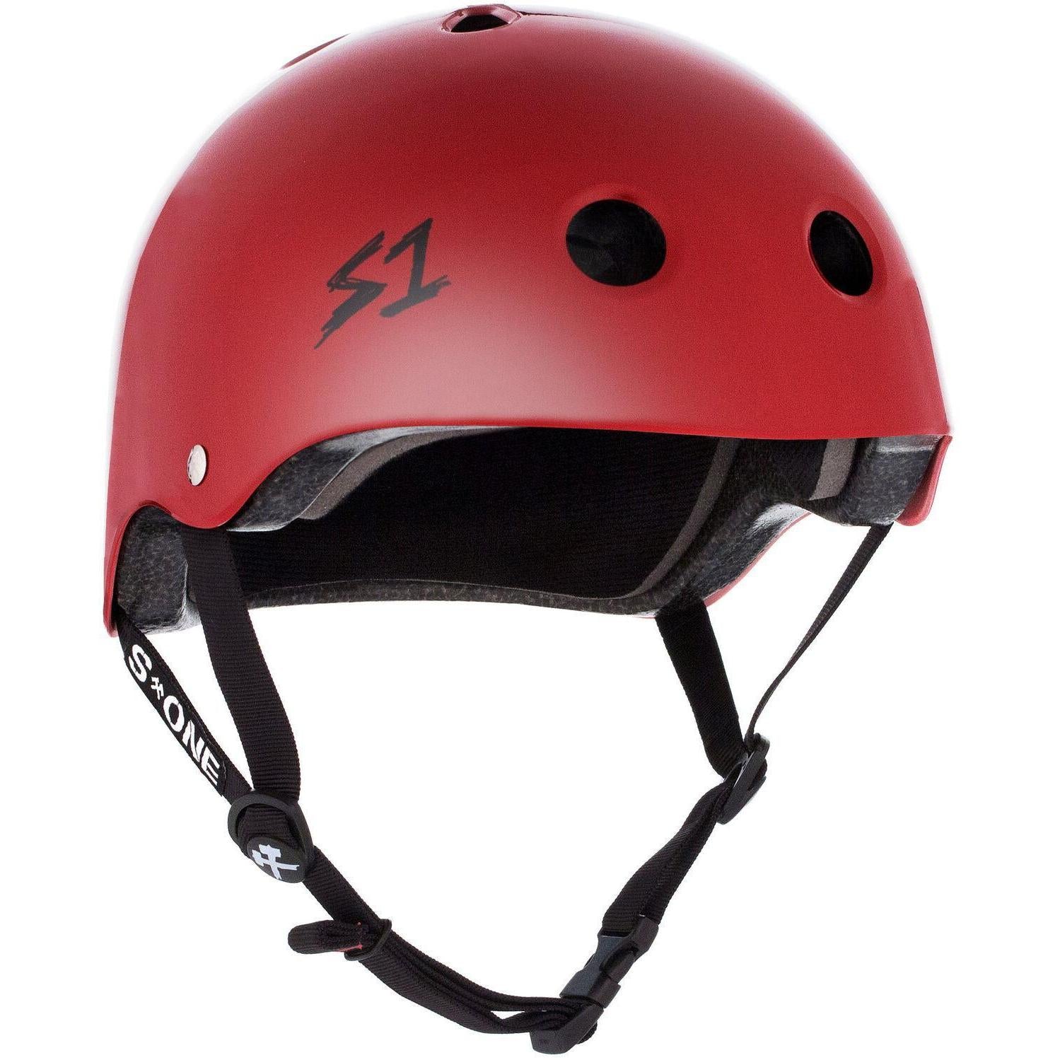 The S-One Lifer Helmet in Blood Red Gloss features ventilation holes, a chin strap, and S1 logos for superior multi-impact head protection in classic skate style.