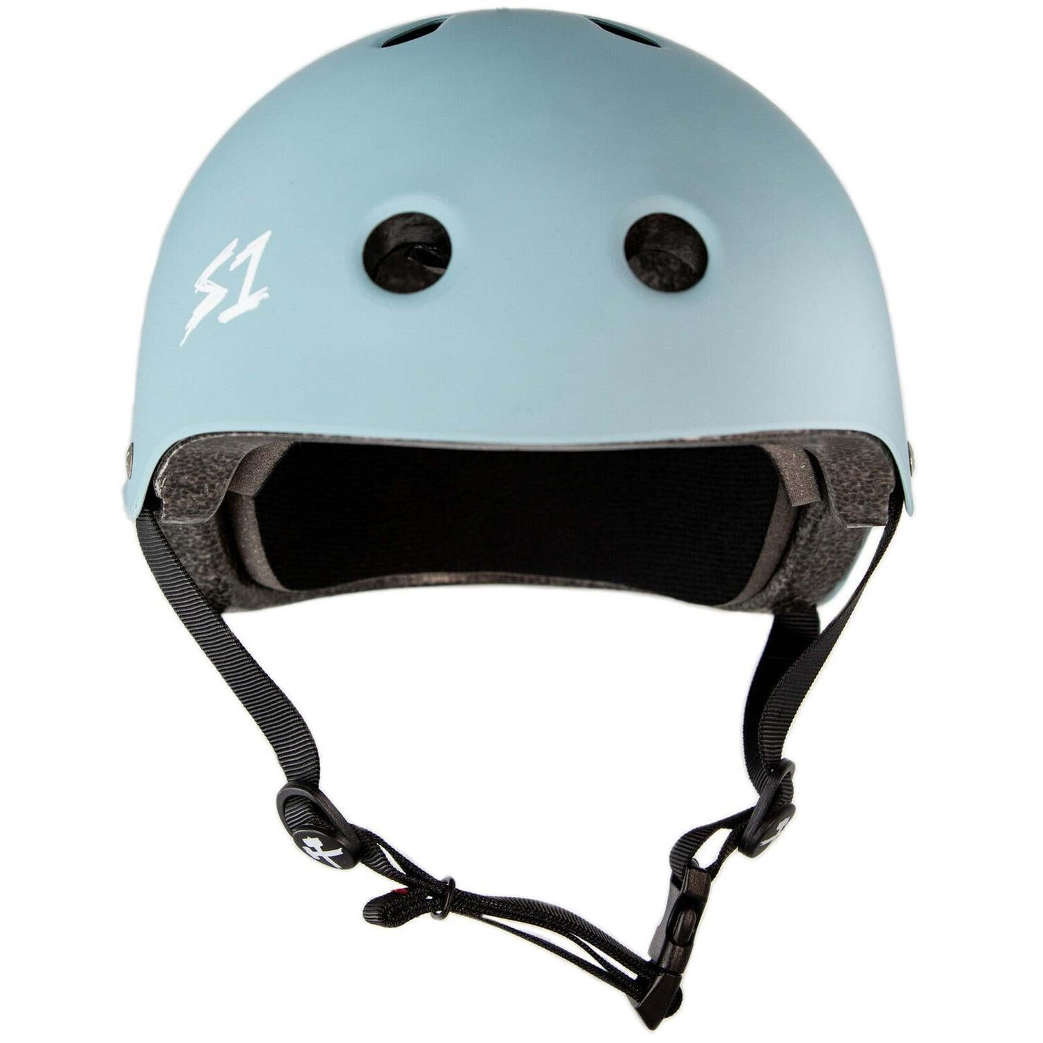 The S-One Lifer Helmet in Slate Blue Matte features black vents, an adjustable chin strap, a white "S1" side logo, and delivers certified multi-impact protection for safety.