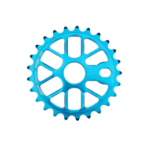 The Mission Nexus Sprocket is a blue 6061 aluminium BMX sprocket featuring multiple cutouts and evenly spaced teeth, shown from above on a white background.