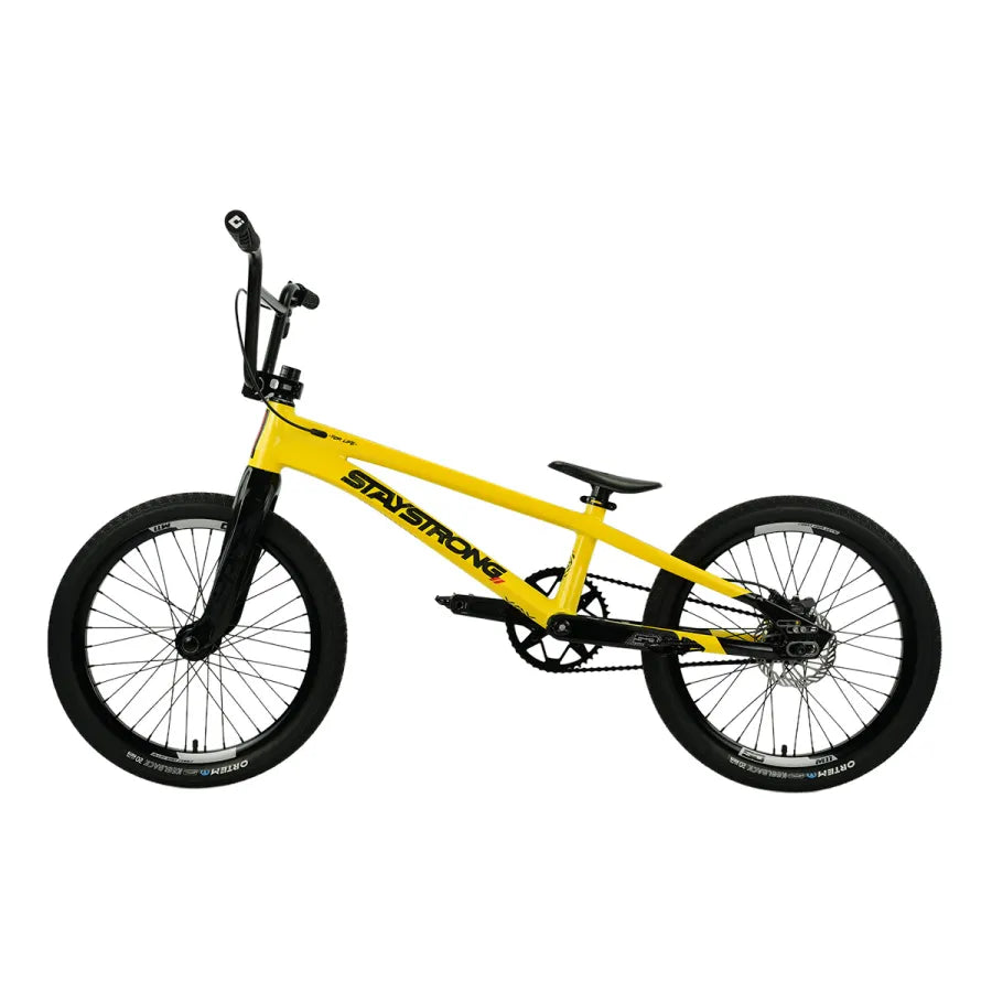 Staystrong V5.1 Cruiser Pro XXL Disc Frame in yellow, equipped with black wheels, seat, and handlebars, showcases a BMX race frame and race geometry for optimal performance, displayed from the side against a white background.
