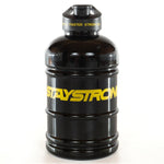 The Stay Strong Water Cannister 2.0 Litre, designed in sleek black, displays the motivational slogan "STAY STRONG" in bold yellow lettering. It includes a Y-shaped spout on the top and comes against a white background.