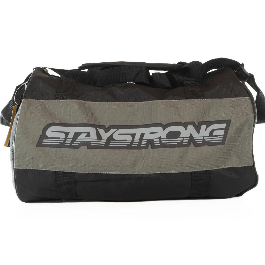 A charcoal Staystrong Duffle Bag featuring the word “STAYSTRONG” in bold, stylized letters—ideal for carrying all your workout essentials.