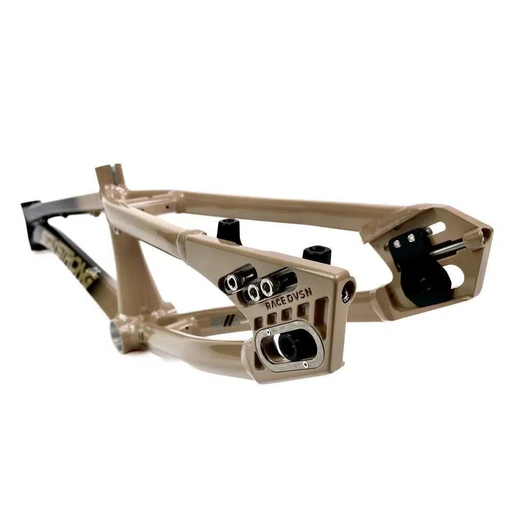 Staystrong V5 Disc Pro XXL Cruiser Frame in tan and black aluminium, shown at an angle highlighting the rear triangle, dropout mounts, disc brake tab, and part of the downtube.