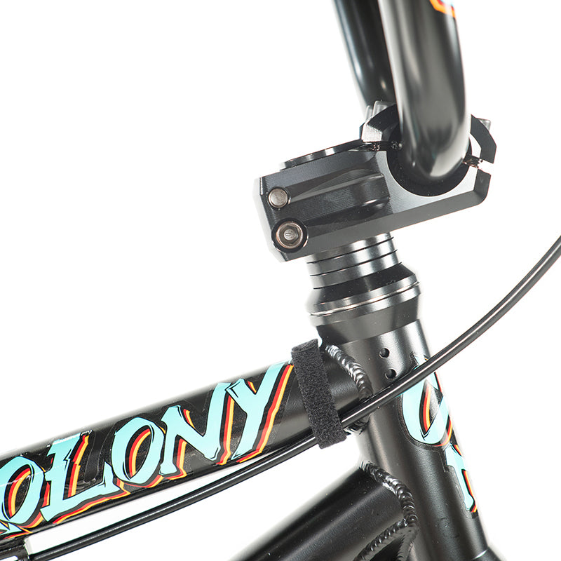 A high-end Colony Sweet Tooth Pro 18 Inch BMX Bike, showcasing its intricate geometry, with the word "Colony" prominently displayed on it.