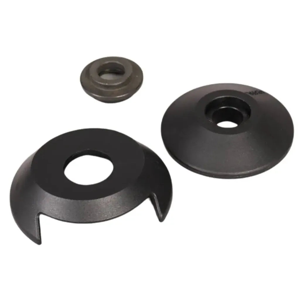 The Tall Order Non-Drive Side Hub Guard Kit w/ Cone Nuts includes three black metal hub guards with various shapes and center holes, shown on a white background.
