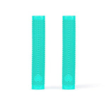 Two Eclat Shogun Grips in turquoise, featuring textured VEX20 rubber and branding on each end, are standing upright side by side on a white background.