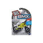 The Tech Deck BMX Bike from the "We the People" Series 16 is a vibrant yellow replica with black accents, recommended for ages 6+. Warning labels are clearly displayed on its packaging for safety. Each model is sold individually and features detailed craftsmanship.