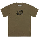 The TLD 25.1 Badge SS T-Shirt is an olive green tee with a central abstract design, perfect for those who enjoy a subtle banger style.