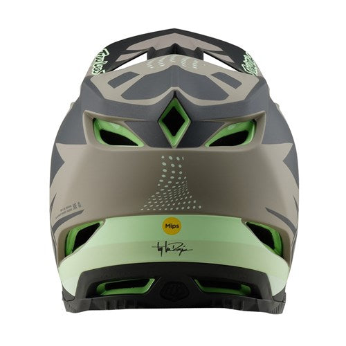 The rear view of the TLD 25.1 D4 Composite Helmet (MIPS) in Optic Timber reveals air vents, a MIPS logo sticker, and a signature, providing the sleek design and safety features expected from a premium downhill helmet.