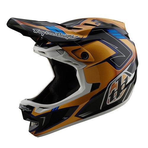 The TLD 25.1 D4 Composite Helmet (MIPS) in Royalty Black/Gold merges style and safety with its full-face motocross design and integrated MIPS protection.