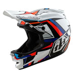 The TLD 25.1 D4 Composite Helmet (MIPS) in white/silver is a full-face motocross helmet featuring blue, red, and black geometric patterns with a visor for optimal protection.