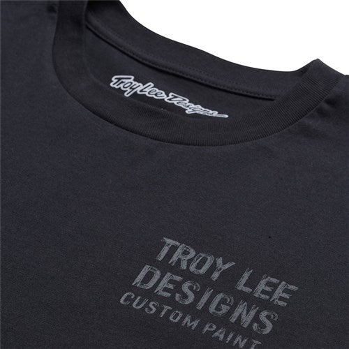Close-up of the TLD 25.1 Paint Shop SS T-Shirt, featuring "Troy Lee Designs Custom Paint" on the front for chilling or shredding, with a small logo on the collar for a subtle touch.