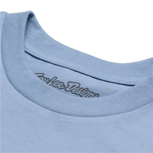 Close-up of a TLD 25.1 Peace Out T-Shirt in blue, featuring "Taylee Designs" printed on the inner collar label, radiating good vibes.