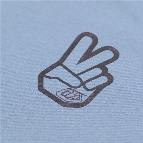 The TLD 25.1 Peace Out T-Shirt features a black peace sign on light blue fabric, ensuring good vibes.