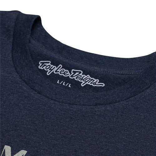 Close-up of a navy tee collar with "Troy Lee Designs" and size "L/L" in white, ideal for daily wear. Product: TLD 25.1 Rotation SS T-Shirt.