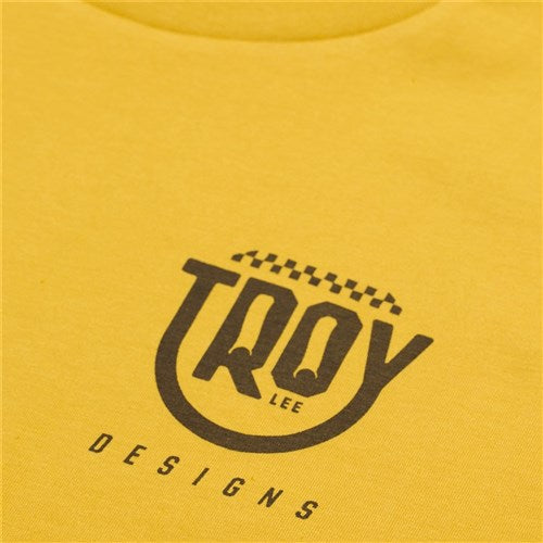 The TLD 25.1 Smiley SS T-Shirt is a vibrant yellow tee that showcases the "Troy Lee Designs" logo in bold black text, perfect for adding style and confidence.