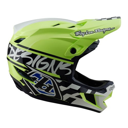 A TLD D4 Polyacrylite Helmet with MIPS protection, in Fifty-50 Navy/Glo Yellow, features graphic patterns and Troy Lee Designs branding for enhanced safety.