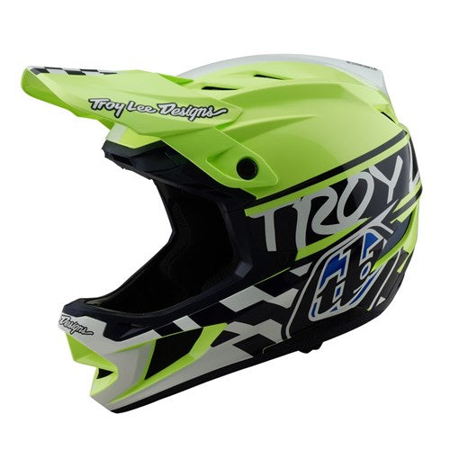 The TLD D4 Polyacrylite Helmet (MIPS) in Fifty-50 Navy/Glo Yellow offers MIPS protection with a geometric pattern and Troy Lee Designs branding on the visor and side for maximum safety.