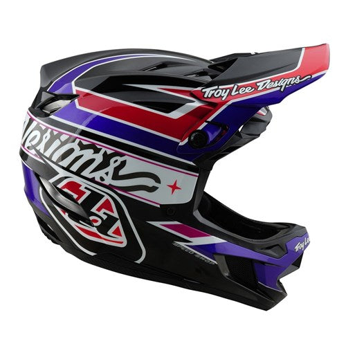 The TLD D4 Polyacrylite Helmet (MIPS) / Linear Black features a vibrant red, black, and purple design with "Troy Lee Designs" text and integrates MIPS brain protection for enhanced safety.
