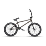 The Wethepeople Envy 20 Inch Bike, a BMX masterpiece, features thick tires, straight handlebars, and a sleek black frame on a white backdrop. With Eclat Tibia Cranks, it offers top-notch performance and style in one exceptional package.