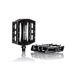 Two black Demolition Trooper Aluminum Sealed Pedals feature durable alloy bodies, visible pins for grip, and a concave feel. "Demolition" branding appears on the side, shown from both side and top views against a white background.