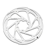 A close-up of a silver TRP Slotted Disc Brake Rotor with multiple cutouts and text indicating specifications such as "140-1.8mm" along with the 6-bolt ISO mounting pattern.