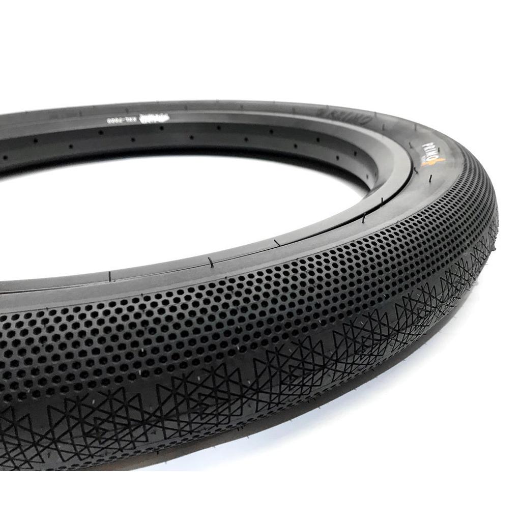 A close-up of the Primo Richter 20 Inch Folding Tyre (20x2.4), showcasing its textured, perforated surface and patterned tread, with a lightweight folding Kevlar bead, displayed on a white background.