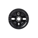 A black Shadow Sabotage Sprocket with a protective guard, logo, and center text is shown on a white background. It’s compatible with the Shadow Conspiracy Supreme chain.