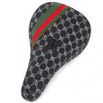 The Subrosa Designer Mid Pivotal Seat (Matt Ray) features a black and white patterned cover with logos, high density padding, and a green and red center stripe.