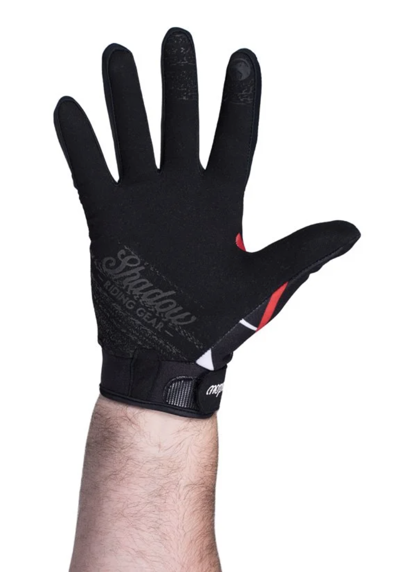 A man's Shadow Conspire Gloves with a strong grip.