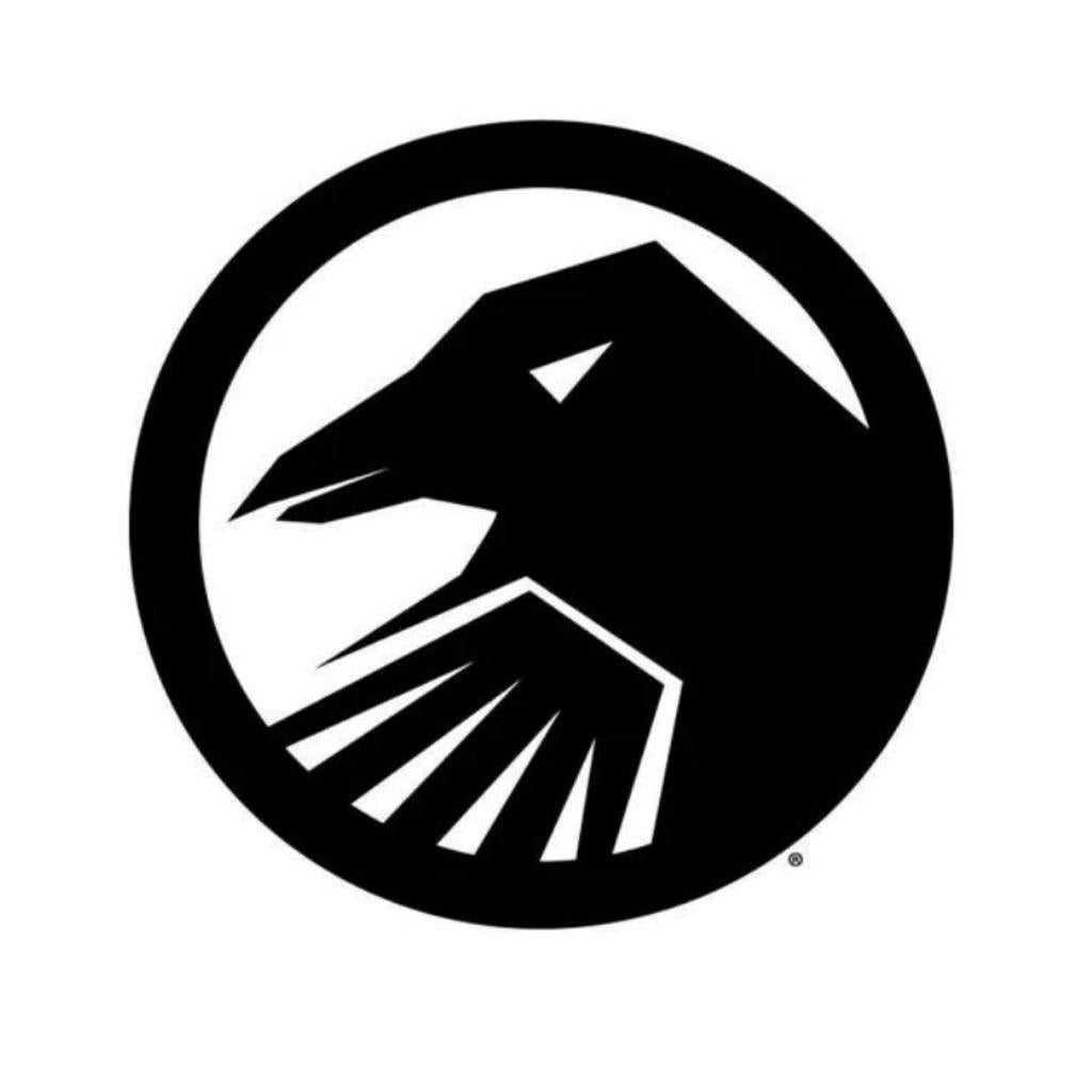 The Shadow Ramp Decal features a geometric black bird silhouette in profile, encased in a black circle on a white backdrop.