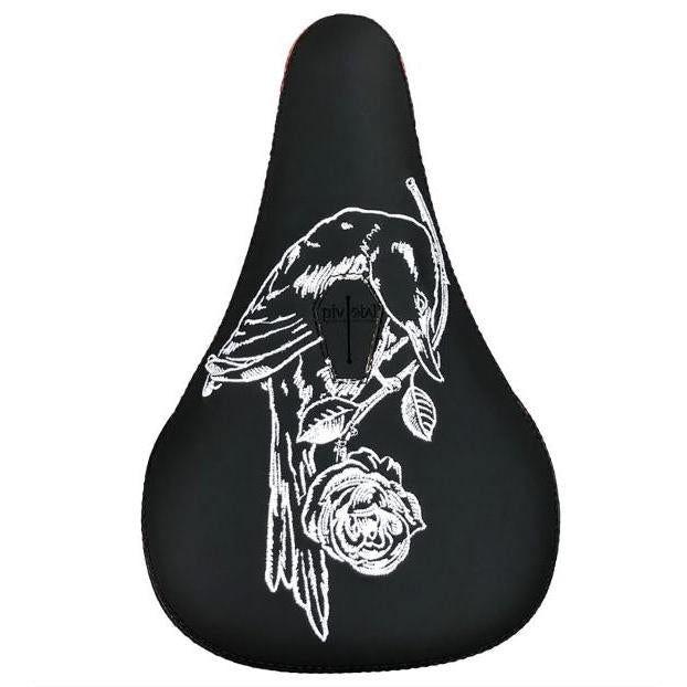 The Subrosa x Shadow Rose Crow Pivotal Seat features a black base with a white embroidered bird on a floral branch, blending unique design with Shadow and Subrosa collaboration for both style and Pivotal system compatibility.