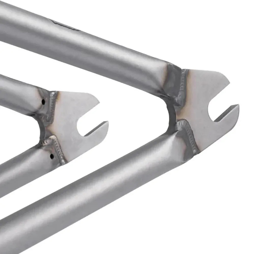 Close-up of the metal rear dropouts on the Subrosa Rose Frame, crafted from strong 4130 chromoly, highlighting the slots for mounting the rear wheel axle.