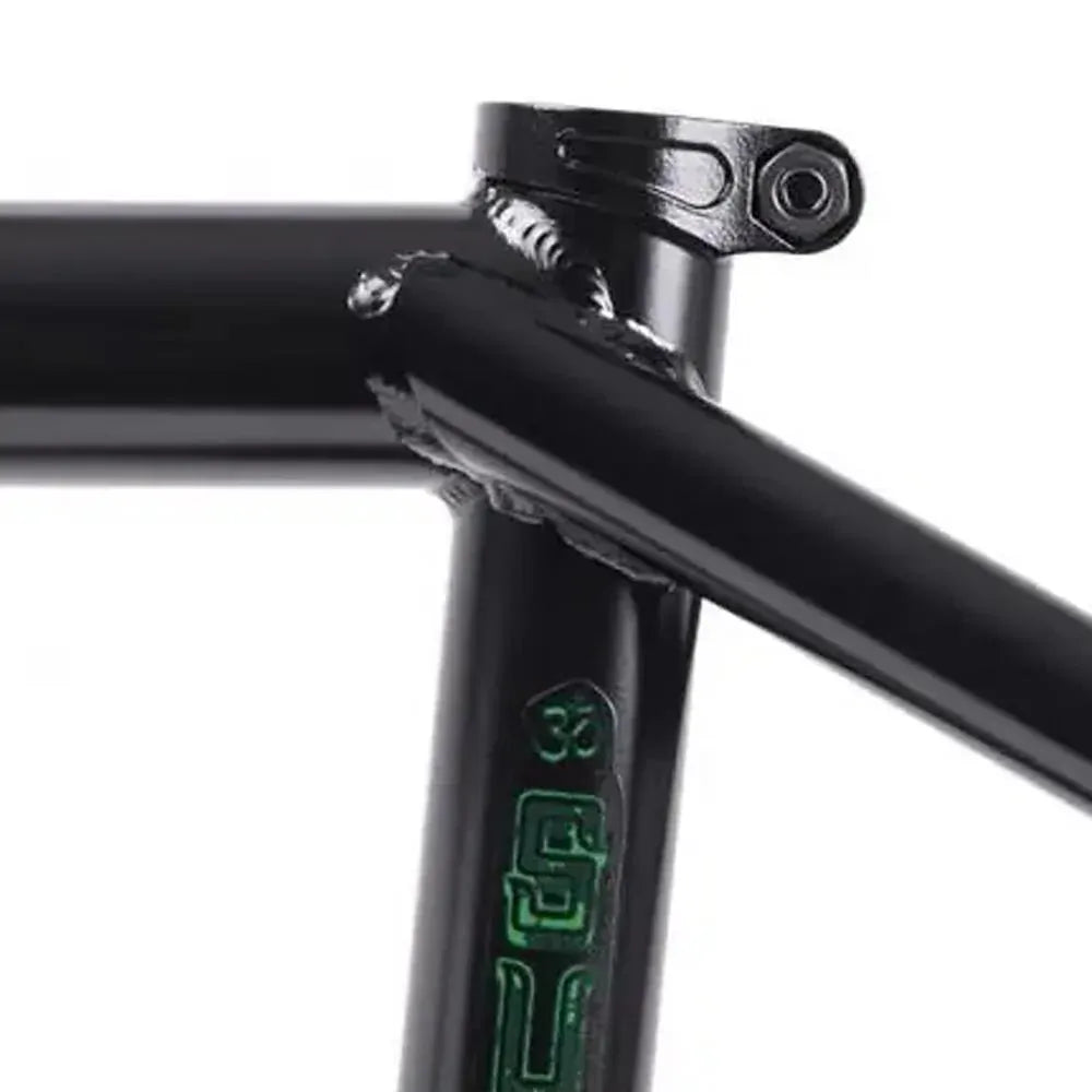 Close-up of a black Subrosa OM V2 Frame, focusing on the welded joints where the seat tube, top tube, and seat post clamp connect—highlighting frame details.