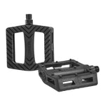 Two black Subrosa Rose Plastic Pedals with textured surfaces and chevron patterns are shown from top and angled side views, designed for secure footing and smooth grinds.