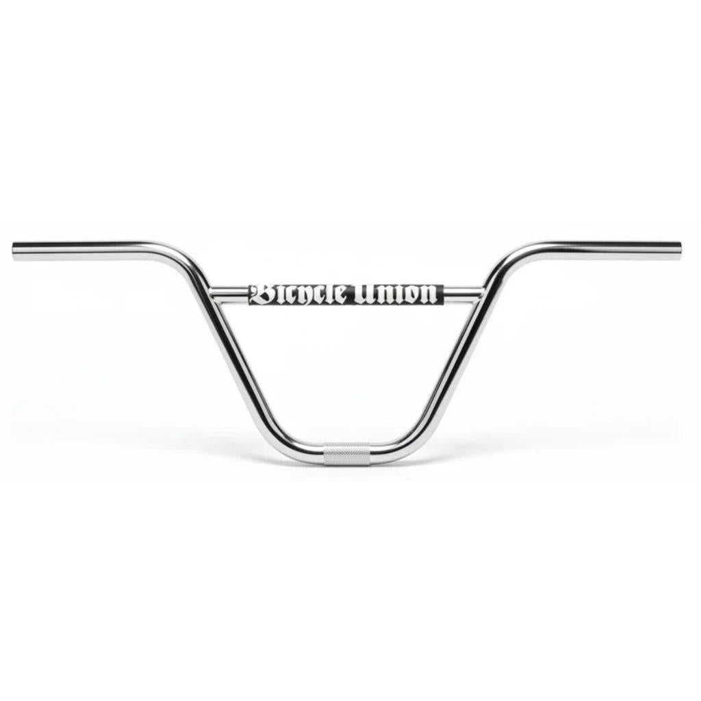 The Bicycle Union Motorcade Bars feature a strong 2-piece chrome construction with a central crossbar and display the “Bicycle Union” logo in bold, gothic lettering. These handlebars are showcased on a clean white background.