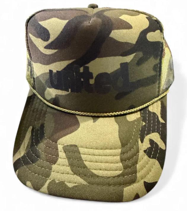The United Coastin Trucker Hat features a camouflage print, mesh back, and "united" boldly printed in black on the front.