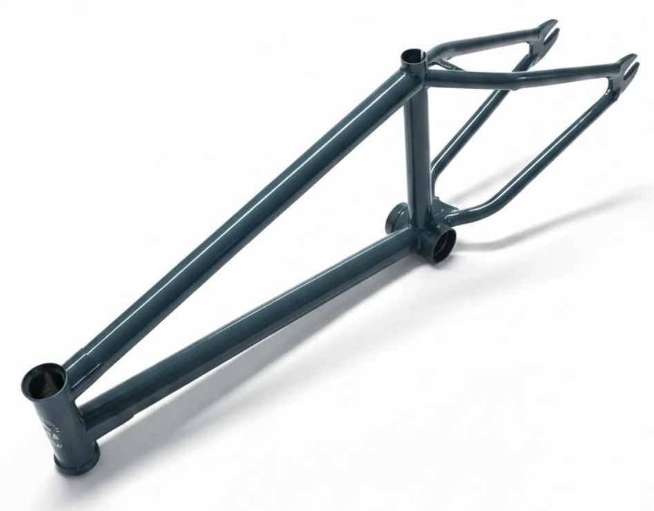 United Pro Model Frame (Marius Dietsche Signature) in a matte blue-gray finish, constructed from premium 4130 Sanko Japanese tubing, photographed on a white background with the top tube, down tube, seat stays, and chain stays clearly visible.