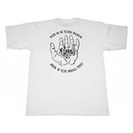 The AM:PM Fate T-Shirt (Street Advisors) is a white Bayside USA 100% cotton tee with a black hand holding a cityscape line drawing and the words “Fate is in your hands. Seek & you shall find.”.