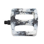 The Odyssey Twisted PC Pro Pedals feature a rectangular shape, marbled black and white design, two large cutouts, and a durable nylon composite build—perfect BMX pedals for top performance, shown here from above.
